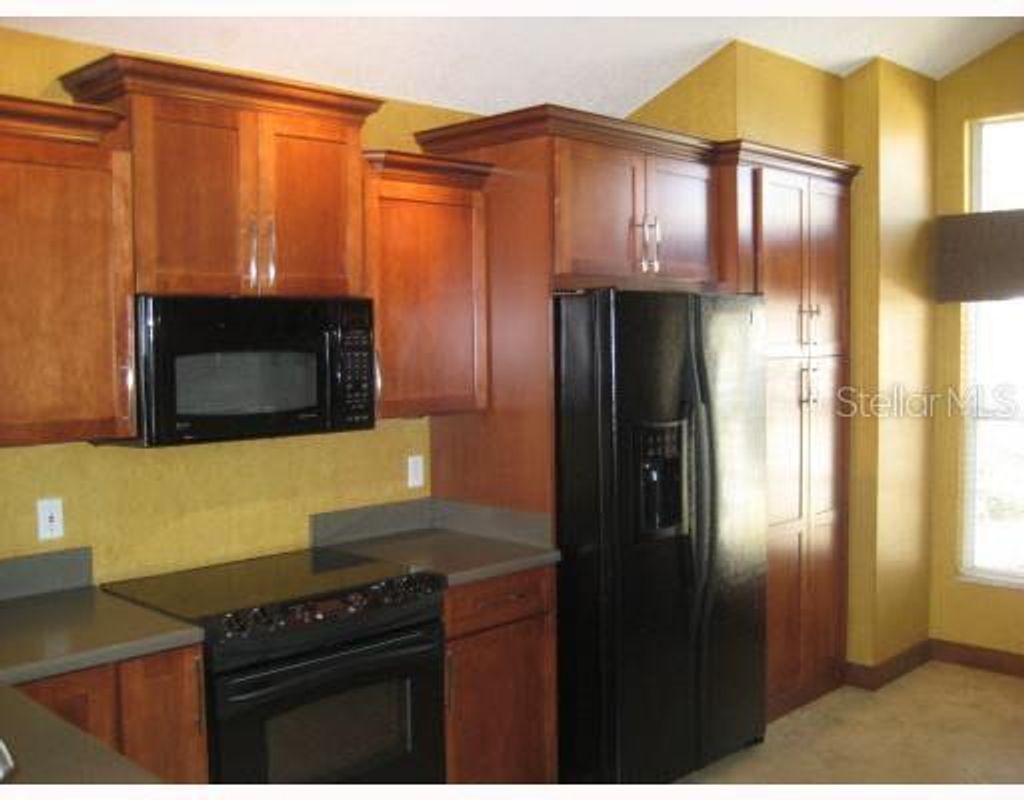 Photo of 14574 Quail Trail Circle, Orlando, FL 32837 (MLS # O6351419)