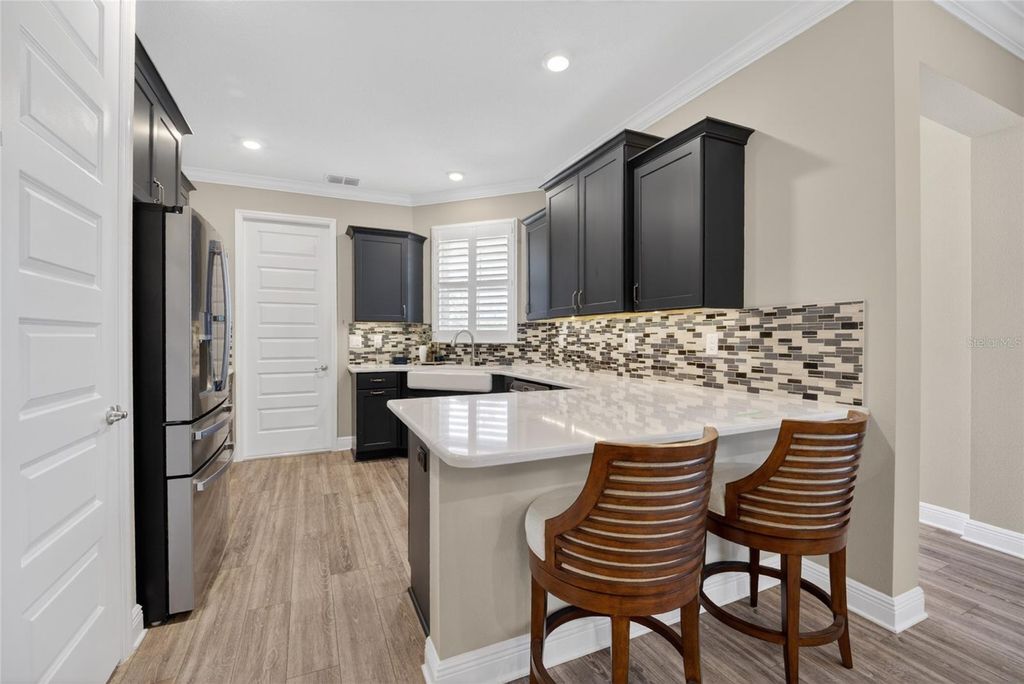 Photo of 10363 SW 96th Loop, Ocala, FL 34481 (MLS # OM725207)