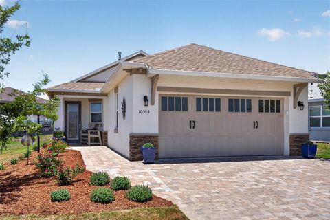 Photo of 10363 SW 96th Loop, Ocala, FL 34481 (MLS # OM725207)