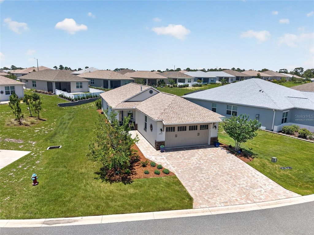Photo of 10363 SW 96th Loop, Ocala, FL 34481 (MLS # OM725207)