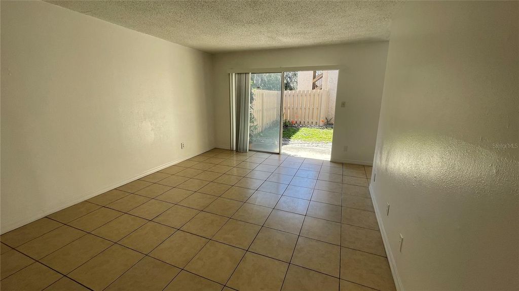 Photo of 7502 Needle Leaf Place #66, Tampa, FL 33617 (MLS # O6412106)
