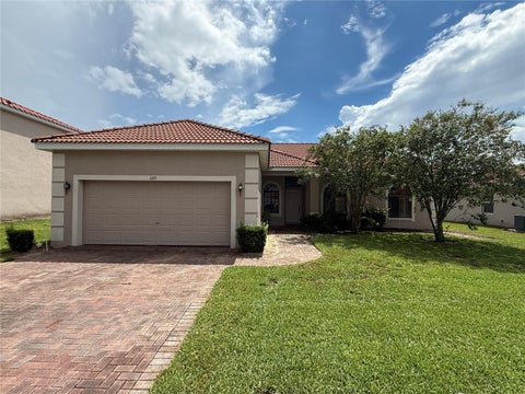 Photo of 439 Caraway Drive, Kissimmee, FL 34759 (MLS # O6417702)