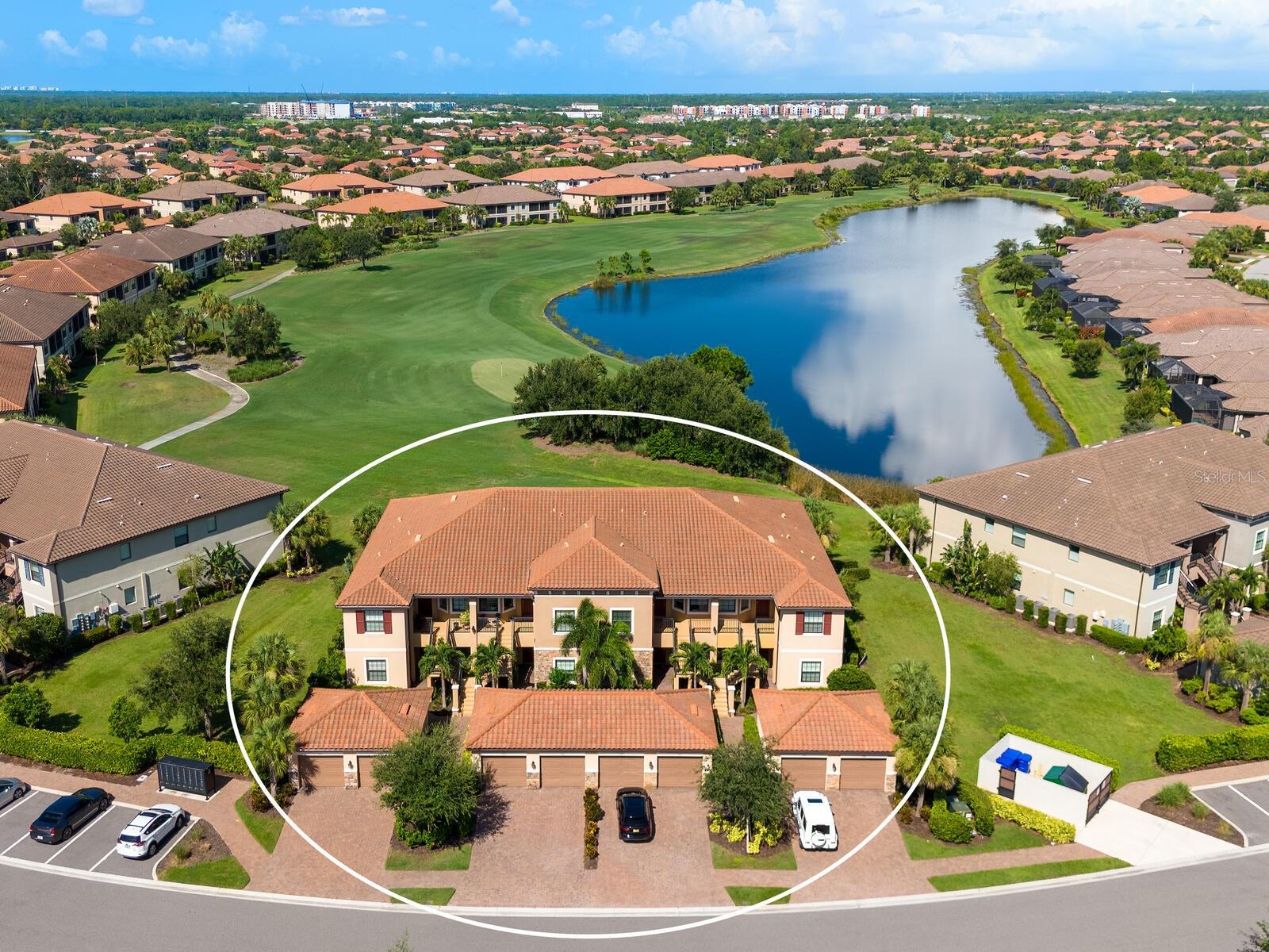 Enjoy resort-style living in your dream GROUND FLOOR END UNIT condo FURNISHED TURN KEY (everything you see is included) located in the highly sought after Esplanade Golf & Country Club at Lakewood Ranch. This “Ready to Move Right in” stunning 2-bedroom, 2-bathroom residence offers 1528 square feet of refined living space and is a testament to modern luxury and convenience. This condo includes a DEEDED GOLF MEMBERSHIP allowing you to enjoy the meticulously maintained Championship Course right from your backyard. A one-car garage provides ample storage and organizational solutions. Enjoy breathtaking golf views from living spaces including the Master Bedroom and lanai seamlessly blending indoor and outdoor spaces. The soft, neutral color palette throughout will mesh perfectly with your own design aesthetic. At the heart of the home is the pristine kitchen with white wood cabinetry, granite countertops, under cabinet lighting, stainless steel appliances, and breakfast bar. A paved walkway from the detached 1-car garage leads to a charming garden courtyard just outside your front door, ideal for enjoying quiet time while sipping your morning coffee. This maintenance-free home offers additional upgrades including recessed lighting, built-in cabinetry in laundry room, designer window treatments, custom closets, crown molding, exquisite lights and fans and much more. The master bedroom boasts walk-in closets, an elegantly designed en suite bathroom with dual sinks, granite counters, and walk-in shower. This exceptional condo offers a blend of luxury, functionality, and a premier location with spectacular golf course views and a FULL GOLF MEMBERSHIP. Mailboxes and guest parking nearby. This amenity rich community features a private clubhouse overlooking the 18th green for dining and music, wellness center, fitness center with group classes, 2 fabulous resort-style pools with spas, lap and resistance designs, satellite pool nearby, tennis courts, pickle ball courts, Bahama Bar, Culinary Center, massage room, outdoor barbeque, bocce, firepits, as well as hiking and biking trails all while located in the center of endless shopping and dining in Lakewood Ranch. Esplanade even includes a doggy park for your furry friends to enjoy. Step into the lifestyle you deserve and arrange your private tour today!