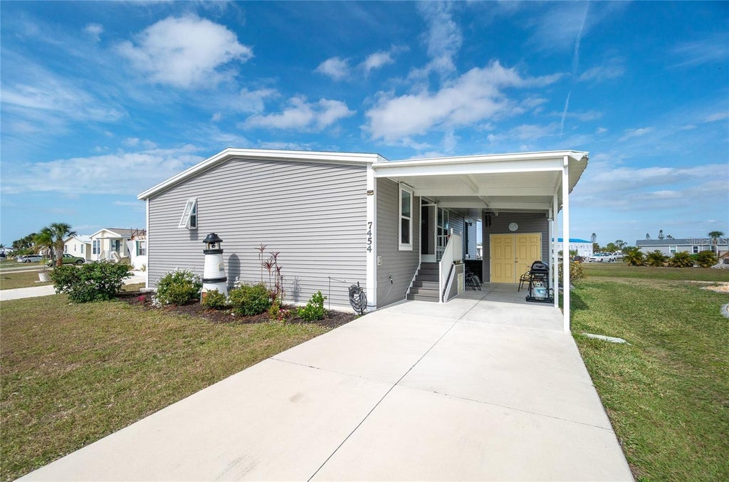 Photo of 7454 Danvers Circle, Port Charlotte, FL 33981 (MLS # C7527959)