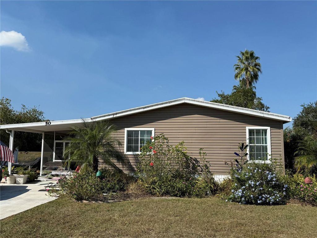 Photo of 50 Magnolia Lane, Wildwood, FL 34785 (MLS # G5104800)