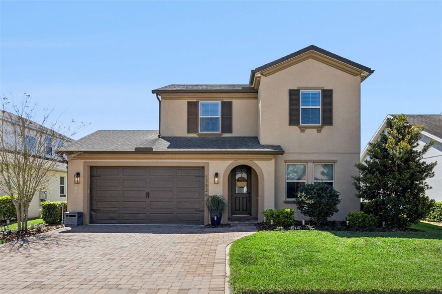 Stunning lake-view home in Waterside at Johns Lake, overlooking Lake Avalon in Winter Garden! This spacious 5-bedroom, 3-bath residence offers 3,196 sq ft of open-concept living with a desirable downstairs primary suite featuring a spacious, well-appointed bathroom along with a customized walk-in closet. A second downstairs bedroom is paired with a beautifully RECENTLY renovated full bath showcasing a newly upgraded walk-in shower—ideal for guests or multi-generational living.

Step inside to a welcoming entry that opens to a versatile sitting area—perfect for a home office or library—leading into a large family room, dining area, and well-appointed kitchen with natural gas range—perfect for entertaining. Enjoy the clean, modern feel of a completely carpet-free interior with durable vinyl flooring throughout the main living areas.

The highlight of this home is the oversized screened lanai, perfectly positioned to capture serene Lake Avalon views—an ideal space for morning coffee, outdoor dining, or relaxing sunset evenings. Upstairs features a versatile loft, three additional bedrooms, and a full bath.

Residents of Waterside at Johns Lake enjoy resort-style amenities including a lakeside pool, clubhouse, fitness center, scenic walking trails, playground, and community dock. Conveniently located just minutes from Winter Garden Village with easy access to 429, Florida’s Turnpike, downtown Orlando, theme parks, and Orlando International Airport.