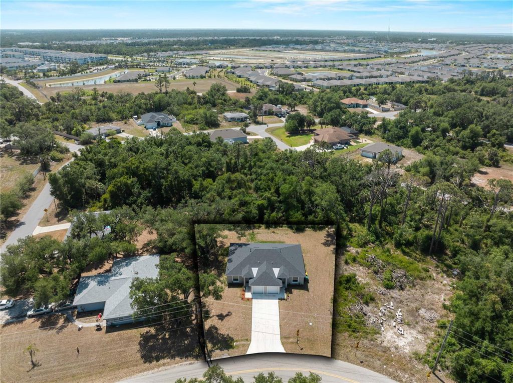 Photo of 15579 Chamberlain Boulevard, Port Charlotte, FL 33953 (MLS # C7509334)