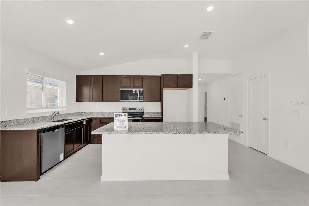 Photo of 216 Rivermill Way, Lake Wales, FL 33859 (MLS # O6369483)