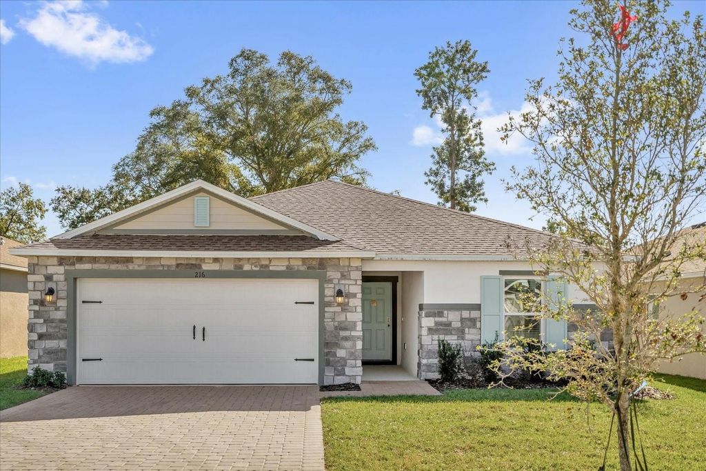 Photo of 216 Rivermill Way, Lake Wales, FL 33859 (MLS # O6369483)