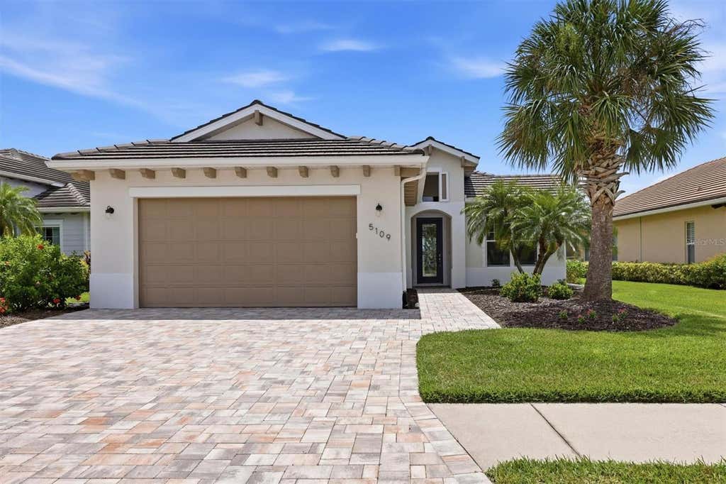 Photo of 5109 Tidewater Preserve Blvd, Bradenton, FL 34208 (MLS # A4704162)