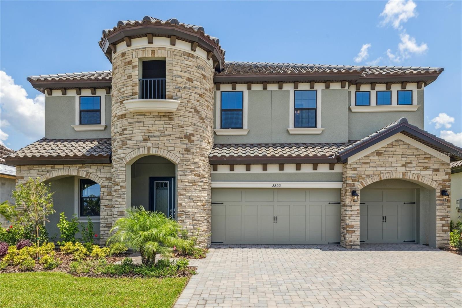Verona -
Welcome home to The Verona at Crosswind Ranch: your dream home awaits in Parrish, FL! Discover the exceptional Verona Quick Move-In home, available now at Crosswind Ranch in Parrish, FL. This stunning two-story residence is designed for modern living, offering both elegance and comfort. As you enter through the impressive double front doors, you'll be welcomed into a spacious foyer that leads to a versatile den , perfect for elegant entertaining or a dedicated home office. The heart of this home is its open-concept design, seamlessly connecting the grand room, island kitchen, and casual dining area. This creates an inviting and warm space, ideal for family gatherings and entertaining friends. For added convenience and privacy, a guest suite and bath are also located on the first floor. Upstairs, the Verona continues to impress. You'll find an expansive bonus room, offering endless possibilities as a playroom, media center, or an additional living area. The private owner's retreat is a true sanctuary, featuring a generous walk-in closet and a luxurious en-suite bathroom. Oversized secondary bedrooms, each with their own spacious walk-in closets, provide ample room for family or guests. Step outside to your expansive lanai, stretching across the entire living room, an ideal space for outdoor dining, relaxation, and entertaining. The large yard provides plenty of room for a future pool or various family activities, perfect for creating lasting memories. Every detail in this home has been carefully selected to enhance its beauty and functionality. Enjoy the thoughtful touches of Sonoma Painted Linen cabinets, Frost Whte MSI countertops, and stylish Pride Plus LVP flooring, all contributing to a sense of warmth and luxury. Don't miss the opportunity to make this beautiful Verona home your own! Experience the charm and luxury of the Verona at Crosswind Ranch, where your dream home is ready and waiting for you. Discover Crosswind Ranch, residents will enjoy a community pool and cabana, pocket parks, and scenic water and conservation views throughout. Listing Price amount for this Pending Sale includes Design and Structural Options.