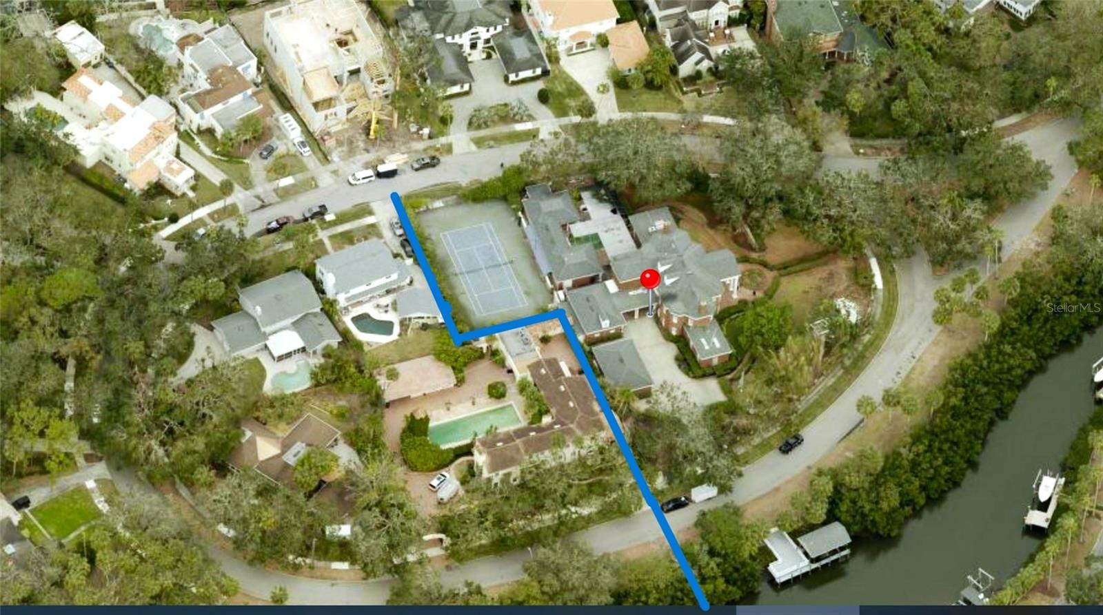 Discover an exceptional opportunity at 5002 South Shore Crest Circle. This rarely available 1.34-acre parcel is primed for transformation into multiple lots, offering an ideal canvas for visionary builders and developers seeking to create a distinctive community with a series of luxury residences, renovate the existing residence or design and build a new primary residence and bring this grand estate back to its full glory.
The property includes a deeded boat dock, granting unique water access that enhances the allure for potential homeowners. In addition, a private tennis court is nestled within the grounds, providing recreational amenities that future developments may want to incorporate and enhance. Additional structures include a free standing 3 car garage, a newly renovated 2 story guest house, a pool house and security guard station at property gates.
Being sold as land, this expansive site allows for flexible planning and design possibilities. Whether you're considering subdividing into multiple residential lots or crafting a single grand estate, this site offers the freedom to innovate and build. Perfectly situated in a desirable Tampa location, this property presents an extraordinary investment for those looking to capitalize on the demand for premium real estate. Embrace the opportunity to design and construct a dynamic community that harmonizes luxury, leisure, and landscape. Make your vision a reality at 5002 South Shore Crest Circle, where potential meets possibility.