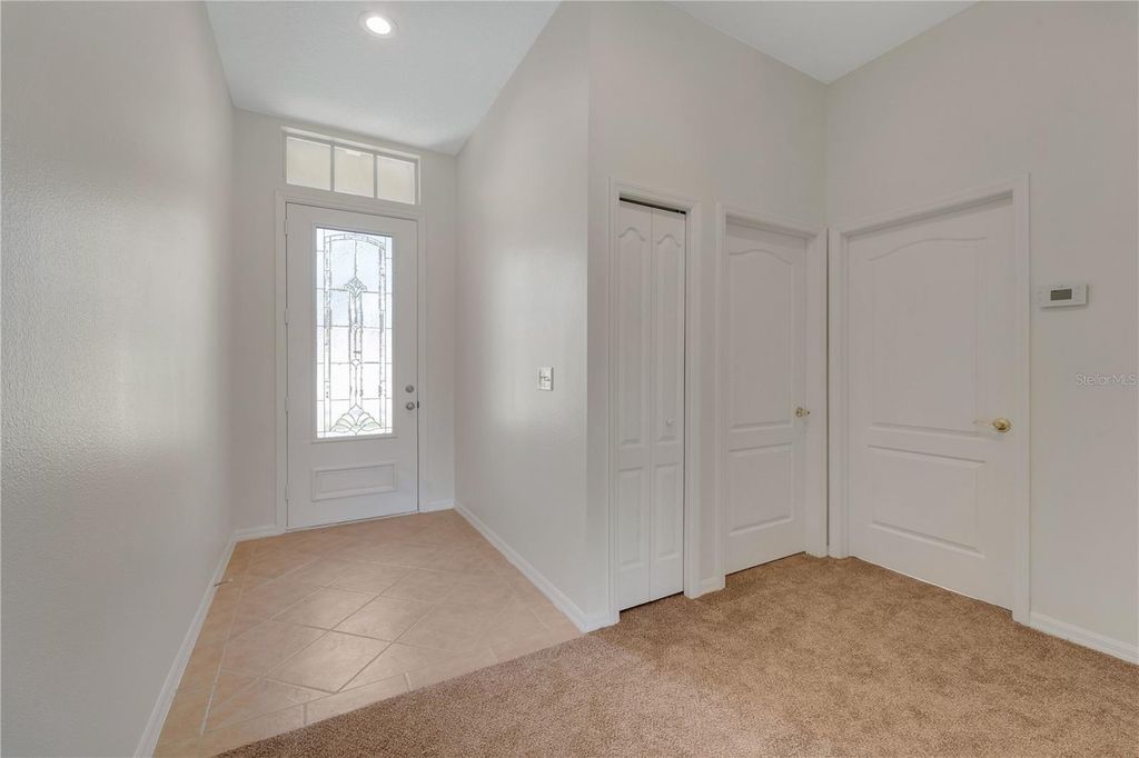 Photo of 1452 Crazy Horse Drive, Lutz, FL 33559 (MLS # O6314770)