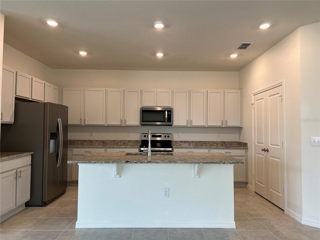 Photo of 9023 Hooton Way, Davenport, FL 33896 (MLS # O6420430)