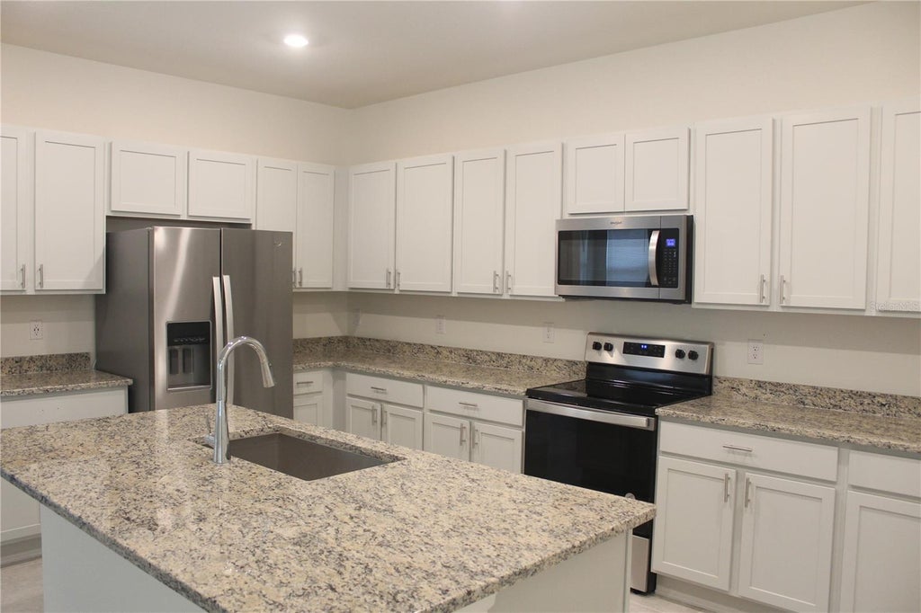 Photo of 9023 Hooton Way, Davenport, FL 33896 (MLS # O6420430)