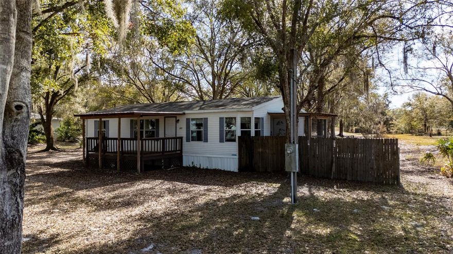 A rare opportunity to own land, privacy, and near lake convenience in the charming town of Frostproof, “The Friendly City.” Ideally located on a quiet cul-de-sac just 2 minutes from the marina with access to Little Crooked Lake, this property offers the perfect setting for relaxed Florida living surrounded by nature.

Situated on an expansive 0.94-acre homesite, the property features mature natural landscaping including mango bushes, Meyer lemon trees, and Brazilian cherry, creating a peaceful retreat. A 12’ x 24’ hurricane rated SmithBuilt shed provides excellent storage or workshop flexibility, while the 15’ x 21’ ground-anchored covered carport offers durable protected parking.

Whether you’re looking for extra land, a quiet retreat near the water, or a property with long-term potential, this opportunity combines location, usable acreage, and functionality in one appealing package.
Seller is highly motivated; excellent opportunity for interested buyers!