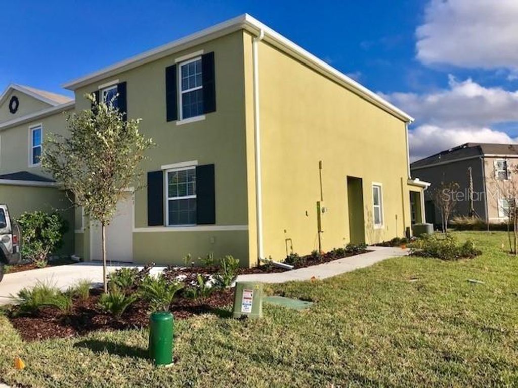 Photo of 403 Arbor Lakes Drive, Davenport, FL 33896 (MLS # S5128941)