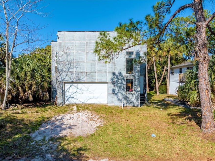 Partial Construction...make this your own!!  Waterfront lot, masonry-block, stucco and wood construction with no expense spared.  Second level is currently designed for the main living areas including, a great room, kitchen, master bedroom, two additional bedrooms and bathroom #2.160 MPH hurricane rated windows, 10' ceilings. Electrical is roughed-in and just needs switches and breakers, plumbing roughed in, A/C ducting installed, insulation installed! Upper level is approximately 2,325 SQ FT. Lower level is approximately 2,000 SQ FT. Lower level is not currently framed for bedrooms, bathrooms or heating/cooling. Lot may be cleared to allow for direct lake access. Any Buyer purchasing the property will be assuming the property in its current condition. Buyer will have to bring their own Builder/Contractor/Engineer. Plans are for a bedroom but present seller has split bedrooms and may not be considered bedrooms.