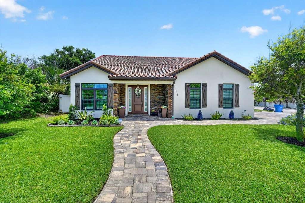 Photo of 114 Coquina Key Drive, Ormond Beach, FL 32176 (MLS # V4950172)