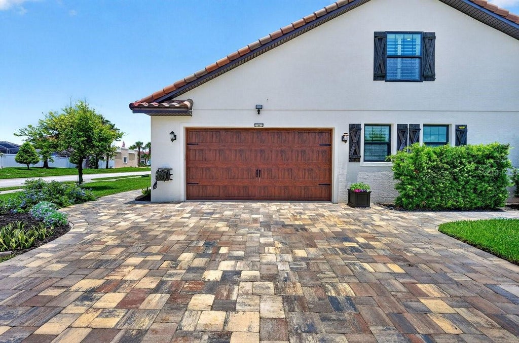 Photo of 114 Coquina Key Drive, Ormond Beach, FL 32176 (MLS # V4950172)