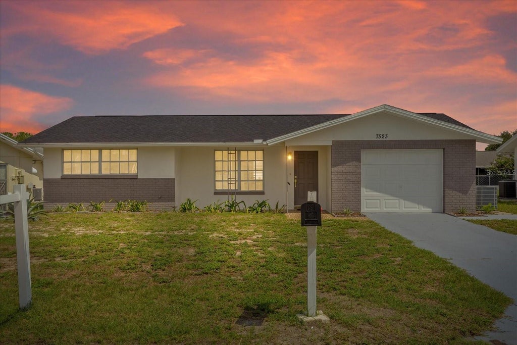 Photo of 7523 Briarwood Drive, Port Richey, FL 34668 (MLS # TB8513124)