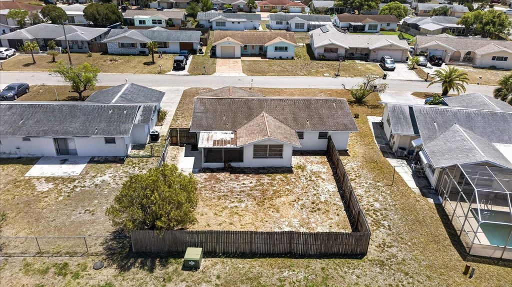 Photo of 7523 Briarwood Drive, Port Richey, FL 34668 (MLS # TB8513124)