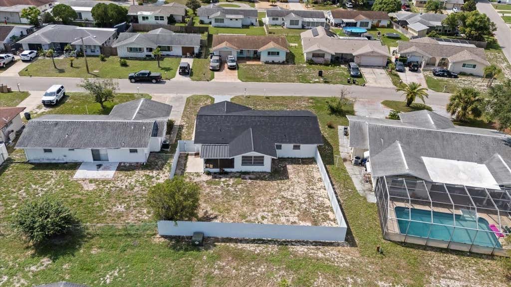 Photo of 7523 Briarwood Drive, Port Richey, FL 34668 (MLS # TB8513124)