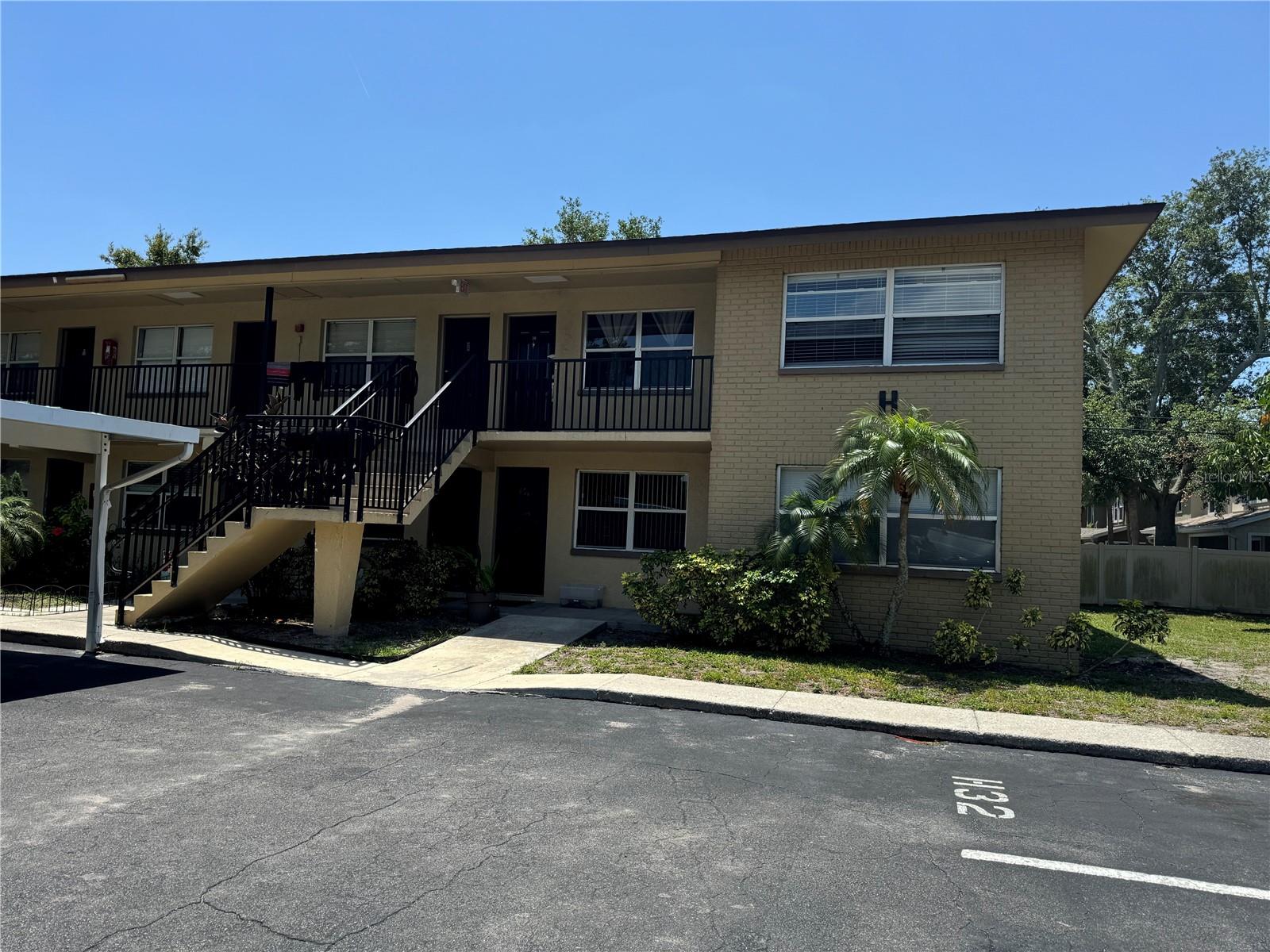 Welcome to Morningside condos! This spacious 1 BR and 1 bath unit is perfect as a rental property. This corner unit features newer kitchen cabinets with extra storage under the kitchen island, tile floor throughout, spacious bedroom offers large wall-to-wall closet. The community offers two swimming pools and three laundry facilities. Great location near US19. Low HOA fee of $348.91/month.