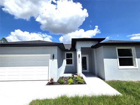 Photo of 142 Fitzsimons Street, Port Charlotte, FL 33954 (MLS # TB8499430)