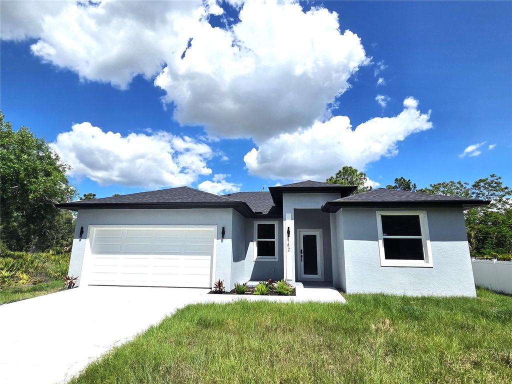 Photo of 142 Fitzsimons Street, Port Charlotte, FL 33954 (MLS # TB8499430)