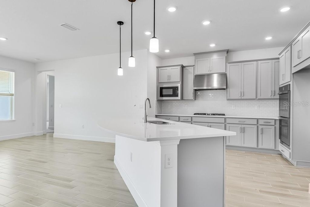 Photo of 668 Junonia Boulevard, New Smyrna Beach, FL 32168 (MLS # O6334879)