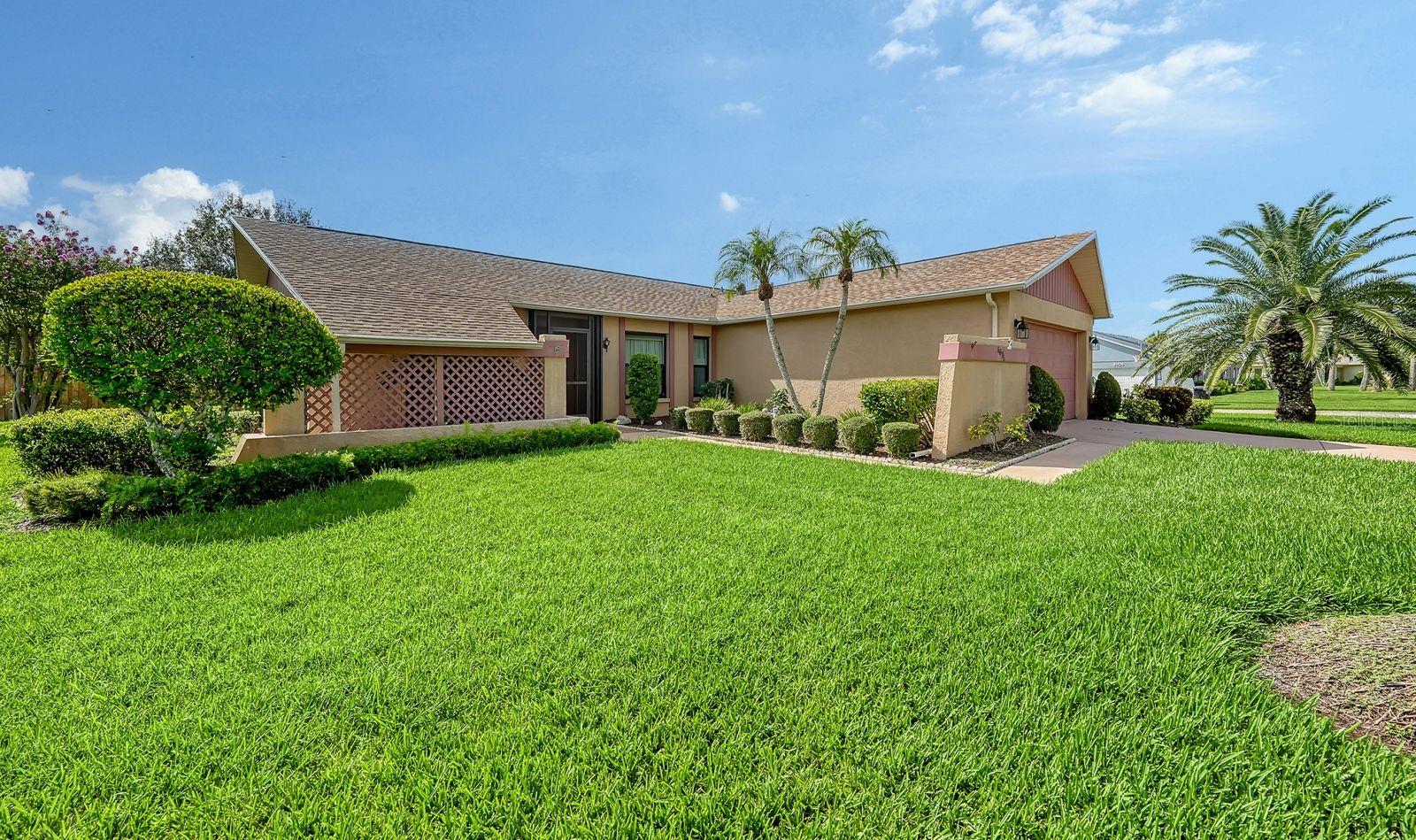 One or more photo(s) has been virtually staged. Hurry on the Lowest Priced Home in Sought After GULF GATE EAST! Make this your wonderful home today! Located on an attractive corner lot on over 1/4 Acre with 2 beautiful palm trees and the property boast a lush, vibrant green lawn that enhances the home's curb appeal. Good bones with this home ... Shingle Roof installed December '24 *Windows/Door replaced '14* Re-plumbed in '12*Updated Kitchen Cabinetry with Granite Tops*Laminate flooring & more! A spacious 26 x 20 Great Room with a woodburning fireplace & vaulted ceilings provide spaciousness and height in this room for a very open feeling! The split floorplan offers 3 Bedrooms & 2 Baths. There is a 26 x 14 covered & screened Lanai for extra room for entertaining and relaxation. There is also a spacious 2 Car Garage for parking/storage. This home is located on a quiet side street and the entire friendly neighborhood is lined with sidewalks on both sides of the streets for walking-biking-jogging! Gulf Gate East is a community of excellent neighbors & has an enforced HOA with low annual dues of $299 which keep the homes looking great! Gulf Gate East also offers larger lots than most & is located in quiet, South Sarasota but just minutes away from our World Famous Siesta Key Beaches & our newly extended Legacy Trail. Sunny Sarasota is a perfect city that offers A+ schools, fine restaurants & many county libraries & the Gulf Gate shops/restaurants. The UTC Mall and cultural downtown are only 20 minutes away for opera, fine arts, theater, movie theaters, fine dining, Selby Gardens & a variety of entertainment throughout the year! Make this affordable home yours in this fabulous neighborhood!