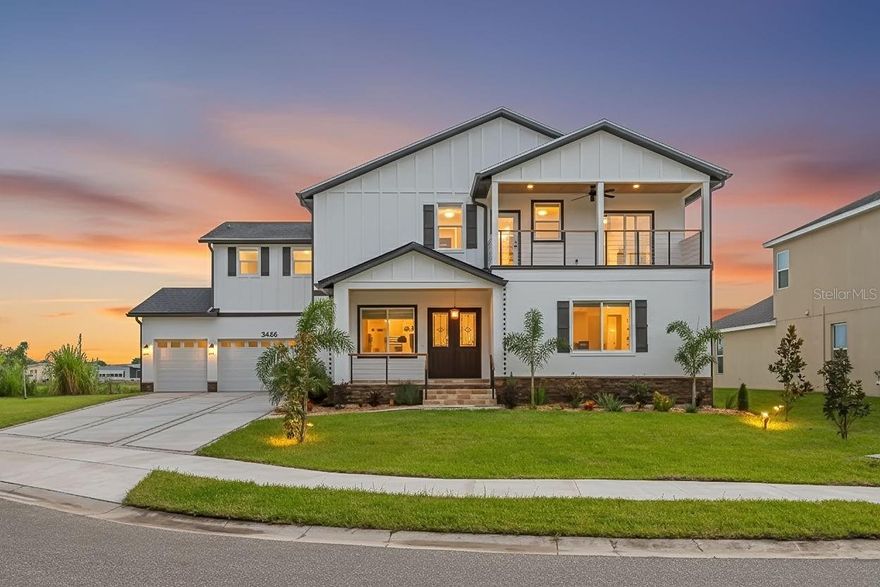 Brand new construction in Safety Harbor, Florida — built in 2025, never lived in, and now priced $173,000 below original list! Welcome to 3426 Channelside Safety Harbor that is a luxury custom waterfront home offering canal water views and over 3,448 square feet of elevated living space (more than 5,000 total square feet under roof) on a spacious 0.25-acre corner lot. Located just minutes from Mease Countryside Hospital, this exceptional property offers a rare combination of luxury waterfront living and immediate access to one of North Pinellas County’s premier medical facilities — ideal for medical professionals, hospital staff, or anyone seeking convenience to healthcare. Situated in one of Tampa Bay’s most desirable communities, this high-and-dry, energy-efficient residence was built to the latest hurricane and safety codes and features impact-rated windows, sliders, and doors throughout. Designed for both elegance and multi-generational flexibility, the home includes four bedrooms, four full bathrooms, two expansive primary suites (one on each level), a three-car garage, and an open-concept floor plan ideal for entertaining. The great room showcases soaring beam-accented ceilings, engineered hardwood floors, and a stacked-stone electric fireplace, flowing seamlessly into a chef’s kitchen with a dramatic waterfall quartzite island with LED backlighting, custom cabinetry, designer tile backsplash, GE Café refrigerator, built-in oven and microwave, electric cooktop with pot filler, and custom vent hood.
Indoor-outdoor living is effortless with sliders opening to a covered porch, travertine pool deck, and private backyard oasis with sparkling pool. The main-level primary suite features a spa-inspired bath, oversized shower, dual vanities, water closet, walk-in closet, and private laundry hookup. Upstairs, a loft leads to the second luxury primary suite with canal-view balcony, freestanding soaking tub, oversized European-tiled shower with dual showerheads, smart toilet, and custom walk-in closets. Two additional upstairs bedrooms offer walk-in closets, ceiling fans, and front balcony access. Exterior highlights include travertine porches, tongue-and-groove wood ceilings, cable railing, California stone inlay driveway accents, and lush professional landscaping. Beyond its proximity to Mease Countryside Hospital, the home is also minutes from downtown Safety Harbor, waterfront parks, Safety Harbor Resort & Spa, top-rated schools, Honeymoon Island, St. Pete–Clearwater Airport (20 minutes), and Tampa International Airport (25 minutes). This move-in-ready luxury new construction offers canal water views, modern efficiency, and an unbeatable Safety Harbor location just minutes from Countryside Mease Hospital. Schedule your private showing today.