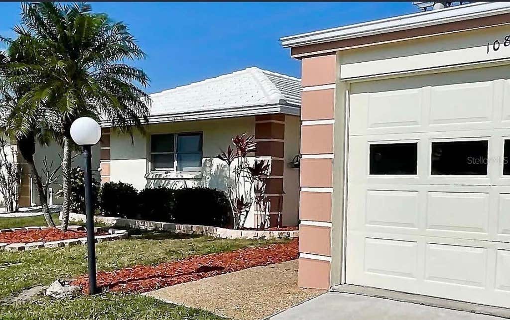 Photo of 108 Villa Drive #108, Osprey, FL 34229 (MLS # TB8539148)