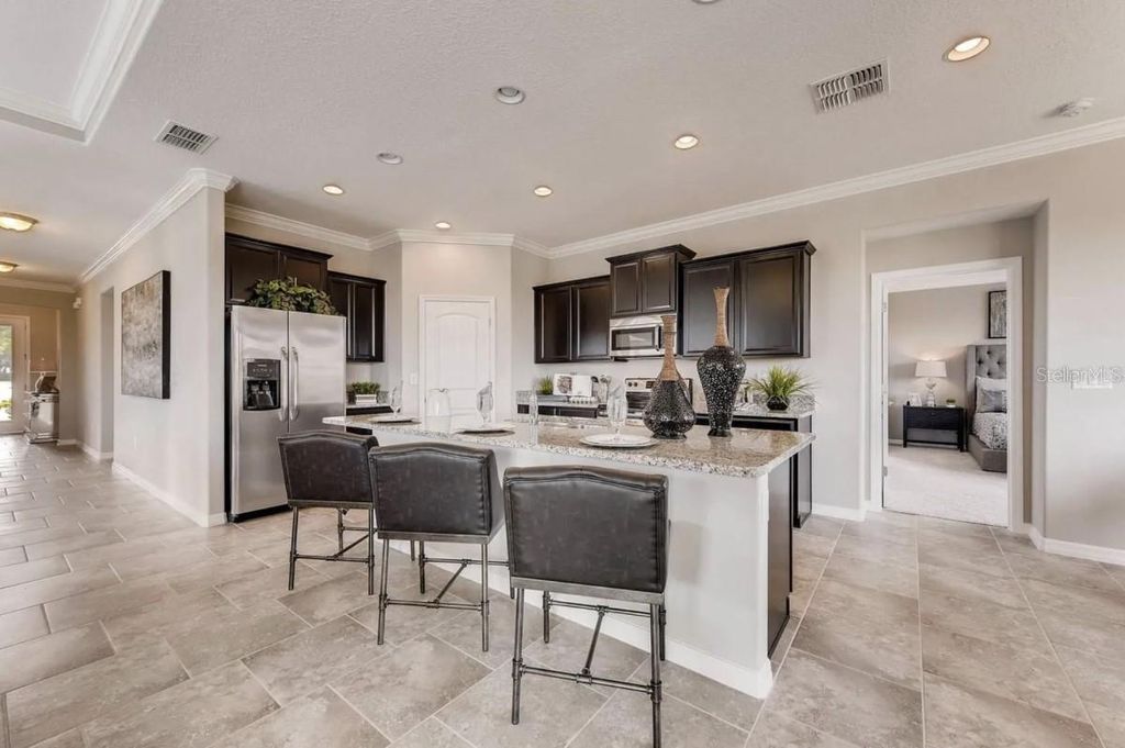 Photo of 1817 Walnut Creek Drive, Kissimmee, FL 34744 (MLS # A4674429)