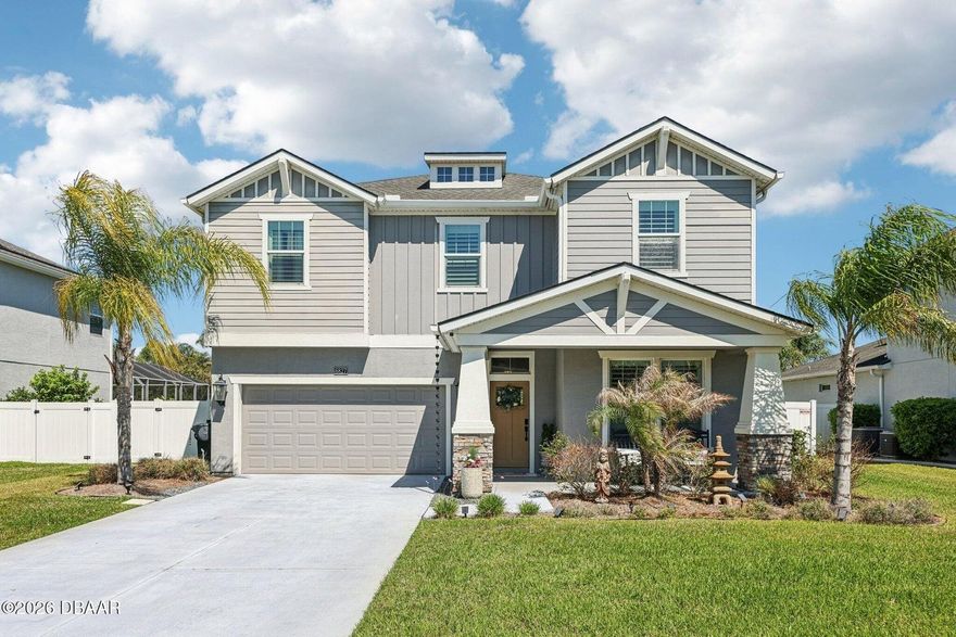 Welcome to Waters Edge, one of Port Orange's most desirable communities. This immaculate 4-bedroom, 2.5-bath home, built in 2018, includes a 1-year home warranty and offers the perfect blend of space, style, and functionality. The open-concept layout features a spacious kitchen flowing into the main living area, ideal for entertaining and everyday living. The kitchen includes high-end appliances, granite countertops, upgraded soft-close cabinets with pull-out shelving, and under-cabinet lighting. Upstairs offers three bedrooms and a large loft, perfect for a media or flex space. Meticulously maintained, professionally designed, and move-in ready. Conveniently located near shopping, restaurants, beaches, parks, and top-rated schools. Additional features include a fenced yard, pergola, and covered lanai for outdoor living.