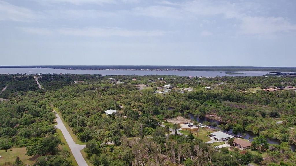 Photo of 13018 Chamberlain Boulevard, Port Charlotte, FL 33953 (MLS # TB8437963)