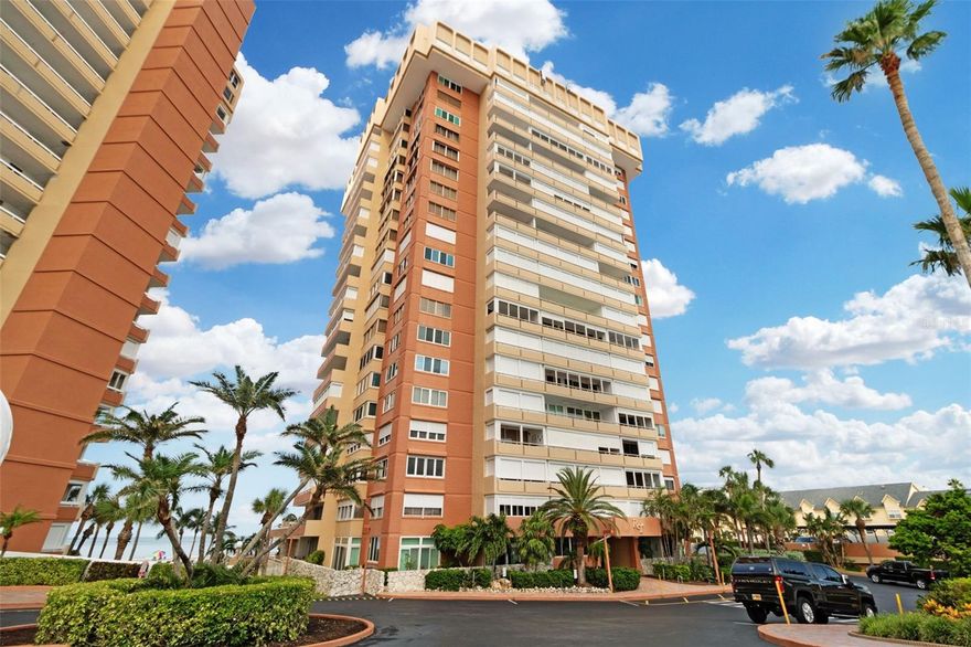 Recently Renovated Condo with Gulf Views & Expansive Outdoor Patio. Discover beachside living at its finest in this beautifully renovated 2-bedroom, 2-bathroom condo in the sought-after Redington Shores community. Spanning over 1,300 sq ft, this light-filled unit offers a view of the Gulf of Mexico and a truly rare feature—a large extended outdoor patio, perfect for entertaining or enjoying quiet sunsets. Step inside to find a home that has been meticulously updated with fresh paint, new flooring, and fully renovated bathrooms. The modern kitchen features sleek new appliances and offers a seamless flow for cooking and dining. For added peace of mind, the condo is equipped with powered hurricane shutters. Located directly on the beach, this gated community provides resort-style amenities including a large pool, fitness center, and recreation center. Residents enjoy the added convenience of 24-hour security and an assigned covered parking spot. 3 month minimum lease term and owner will consider long-term as well.