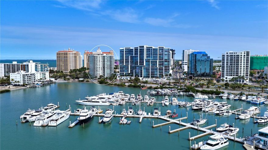 Perfectly positioned on the 10th floor at One Watergate, Residence #10E offers a light-filled downtown Sarasota lifestyle with sweeping city views that extend to Sarasota Bay and the iconic John Ringling Bridge. Ideally located along Gulfstream Avenue, this residence places you just steps from the waterfront, marina, and the cultural energy that defines downtown living. 
Spanning approximately 1,575 square feet of interior living space, the open-concept layout is designed for both comfort and functionality. Expansive impact-rated windows and sliding glass doors (updated in 2017) frame the skyline while filling the residence with natural light. Tile flooring runs throughout, creating a cohesive flow from room to room and enhancing the ease of maintenance.
The living and dining areas connect seamlessly to the kitchen, where solid-surface countertops, breakfast bar seating, and ample cabinetry support both everyday living and entertaining. Just beyond, sliding glass doors open to an oversized terrace—an inviting outdoor extension of the living space and an ideal setting to enjoy morning light or evening city views.
The split-bedroom floor plan enhances privacy. The primary suite is a comfortable retreat featuring direct terrace access, an oversized walk-in closet with dressing area, additional linen storage, and an en-suite bath. The guest bedroom is positioned on the opposite side of the residence and also enjoys water views, making it ideal for visitors or flexible use as a home office.
Additional highlights include two secure under-building parking spaces—an uncommon convenience for downtown living—as well as access to community laundry facilities located on each floor. 
One Watergate is a well-established downtown community that has recently undergone extensive renovations, further elevating its appeal. Improvements include new impact windows and exterior doors throughout the building, a new roof, renovated corridors, a refreshed lobby with updated elevator and mailroom, a new fitness center (currently being completed), conference room/library, and enhanced common areas and landscaping. Residents enjoy secure building access, on-site management, a resurfaced swimming pool with pavered sun deck, grilling area, and newly updated tennis and pickleball courts.
Located in the heart of Sarasota’s Cultural Coast, this residence offers exceptional proximity to everything the city has to offer. Marina Jack, Bayfront Park, and the waterfront promenade are just moments away, while the Sarasota Opera House, Florida Studio Theatre, and Selby Gardens anchor the area’s vibrant arts scene. St. Armands Circle and Lido Beach are only minutes away, providing access to boutique shopping, waterfront dining, and Gulf-front relaxation.
Residence #10E presents an opportunity to enjoy walkable downtown living with city and water views, generous interior space, and the convenience of a well-updated community in one of Sarasota’s most desirable locations.