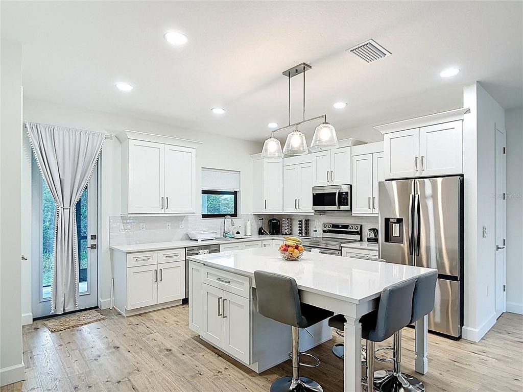 Photo of 12033 Sarto Lane, North Port, FL 34287 (MLS # D6147061)