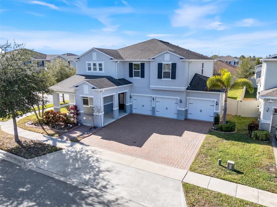 Spacious 5-bedroom, 4-bath home on an oversized corner lot with a fully fenced vinyl backyard and 3-car garage in sought-after Orchard Park, Winter Garden! Fresh interior paint and a flexible floor plan make this home move-in ready. The main level features an open living area, well-sized kitchen, private office, and a downstairs bedroom with a full bath perfect for guests. Upstairs offers a large loft, three additional bedrooms, two full bathrooms, and a generous primary suite with dual walk-in closets and a spacious en-suite bath. Enjoy the covered lanai overlooking the fenced yard, ideal for pets, play, or outdoor living. Orchard Park residents enjoy community amenities including a pool, playground, and walking paths. Conveniently located near shopping, dining, and local nature trails. Schedule your showing today!