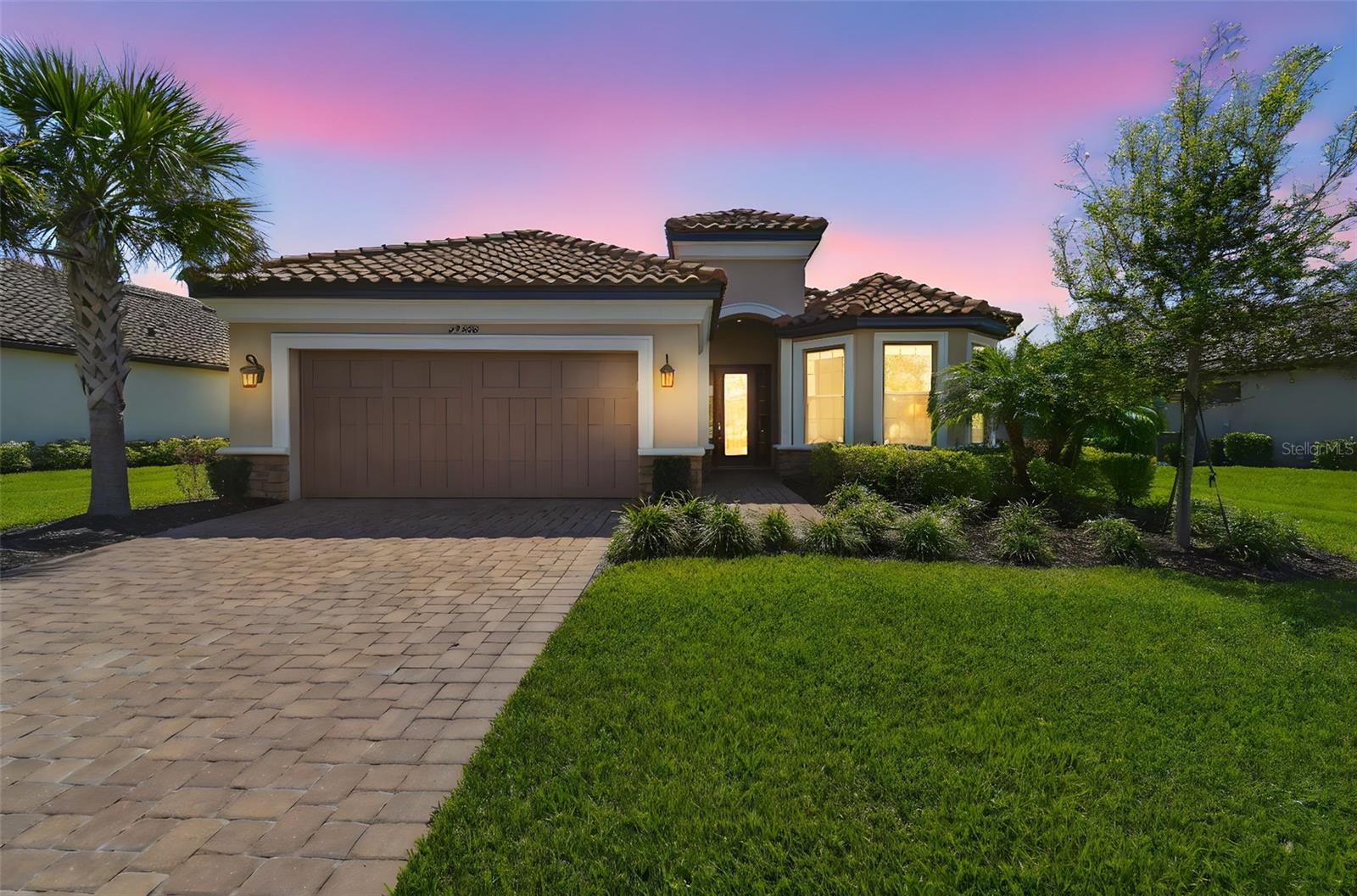 Esplanade at Wiregrass Ranch a 55+ active community. This home features 2,334 SF, 3 bedrooms, 3 baths, an office/flex room, an extended garage on an oversized conservation lot. You will notice the attention to detail as you enter the custom glass door to an open floor plan, extended gourmet kitchen overlooking a large family room and dining room, featuring 42” solid wood cushion close cabinets with crown molding, quartz counters, under cabinet LED lighting, upgraded stainless steel appliances, porcelain farm sink, enormous island with prep sink, an ample walk-in pantry and extra counter space all designed for entertaining. The owner’s oversized suite has dual sinks, walk in shower, a huge closet, and a tray ceiling. The family room boasts coffered ceilings with crown molding, and lots of natural light. Bedroom two has an ensuite bath and bedroom three has a bay window extension. This one-story Taylor Morrison custom home has an open floor plan with an extensive list of upgrades. These upgrades include but are not limited to dining room with custom wall mirrors, extended eat in kitchen, designer tile floors throughout in common areas, custom designer drapes, quartz counters in bath, extended paver driveway, tile roof, large laundry room with cabinets, garage with epoxy floors, and water softener. The premium oversized conservation lot boasts custom landscaping. Step out on to the covered screened lanai and you will be ready to enjoy the Florida outdoors. Esplanade of Wiregrass Ranch has a luxurious upscale club house with full-time lifestyle and fitness directors. The Venue includes a resort style pool, hot tub, cabanas, dog park, state-of-the-art 24-hour fitness center, billiard/card room, and spa room. For active outdoor entertainment there is a firepit, tennis, pickleball, bocci, and a large meeting/gathering area.
Esplanade also includes worry free yard maintenance, reclaimed water and Spectrum TV and internet package included in fees.
This home is located only minutes from shopping, I-275, I-75, hospitals, restaurants, recreation, and entertainment. Come see for yourself this exquisite residence and call it home! Please see walkthrough and Matterport 3D tours.