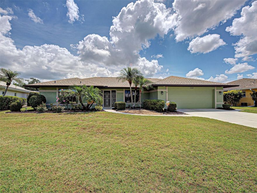 This gorgeous home in the sought-after Jacaranda Country Club West sits on a PREMIUM LOT with EXPANSIVE, UNOBSTRACTED WATER VIEWS that can be enjoyed from multiple rooms. A large HEATED POOL overlooks the lake through the upgraded PICTURE-FRAME screened lanai, creating a truly serene backdrop.
MAJOR updates include a NEWER ROOF (2022), HOT WATER HEATER (2025), APPLIANCES (2018), NEWER CARPET in the primary bedroom, and a POOL CAGE replaced in 2021. The lanai flooring was resurfaced and painted in 2023.  The home is offered turnkey furnished for added convenience.
Inside, you’ll find 3 bedrooms, 2 bathrooms, and an updated kitchen featuring white cabinetry, wood-look countertops, and a pass-through window to the lanai—perfect for a tiki-style serving area. The home offers not one, but two spacious living areas, both capturing the stunning water views through sliders. The main great room features beam accents and a cathedral ceiling, giving the space an open, airy feel.
The primary bedroom includes sliders to the lanai, two walk-in closets, and an ensuite bath with a walk-in shower. This home offers a true split floor plan with the guest side of the home providing a large guest bedroom with a walk-in closet and a full bathroom with direct lanai access—ideal for pool days. A third bedroom filled with natural light through the sliders, features a walk-in closet as well!
The lanai is a standout feature—massive in size, partially covered, and offering rare, wide lake views with complete privacy. The oversized laundry room can also double as office space, craft room or extra storage. The long driveway accommodates up to six cars, perfect for entertaining, and the cul-de-sac location provides a quiet, low-traffic setting. Neutral tones throughout make the home truly move-in ready, and it has been METICULOUSLY MAINTAINED and USED SEASONALLY.
Additional highlights include a 2-car garage with extra storage, attic access and a ceiling fan. 
Located in one of Venice’s most established and beautifully maintained communities, Jacaranda West is known for its mature landscaping, peaceful setting, very low HOA fees, and no CDD—a rare find in the area. Optional memberships are available through Jacaranda Country Club, giving residents the opportunity to enjoy golf, dining, and social activities if desired. Its close proximity to many pristine gulf beaches, shopping, dining, interstate access and vibrant Wellen Park.
