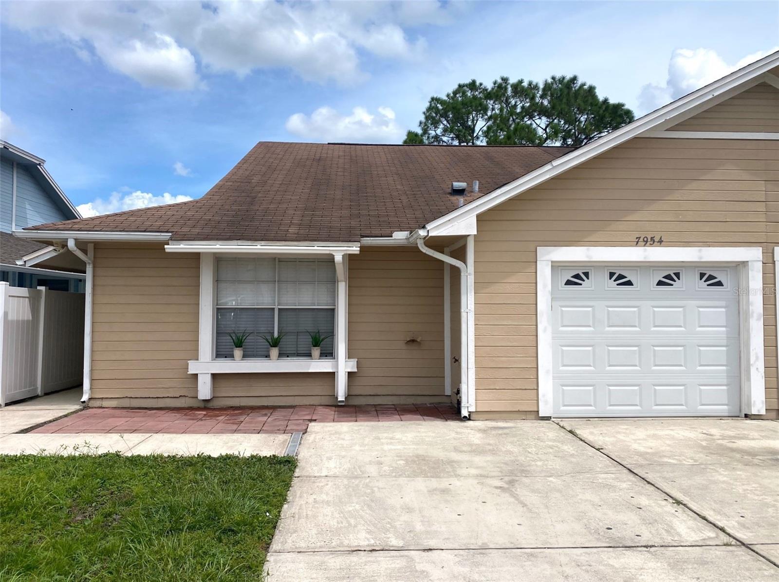 Convenient and comfortable 3 bedroom, 2 bathroom Half-Duplex home. Renovated kitchen with Quartz countertops; Kitchen with breakfast nook; Upgraded bathrooms; New ceiling fans and lights; New room doors; New window blinds; Whole house re pipe 2019; Water heater 2019; AC 2021; New garage door Sep. 2020; Tiles through-out the house. Interior and Exterior paint 2022; Screened patio overlooks the large fenced backyard. Water view from the great room and back patio; Split floor plan; High ceiling, one car garage. Close to Waterford Lakes Town Center, UCF, Orlando International Airport, and Downtown Orlando.