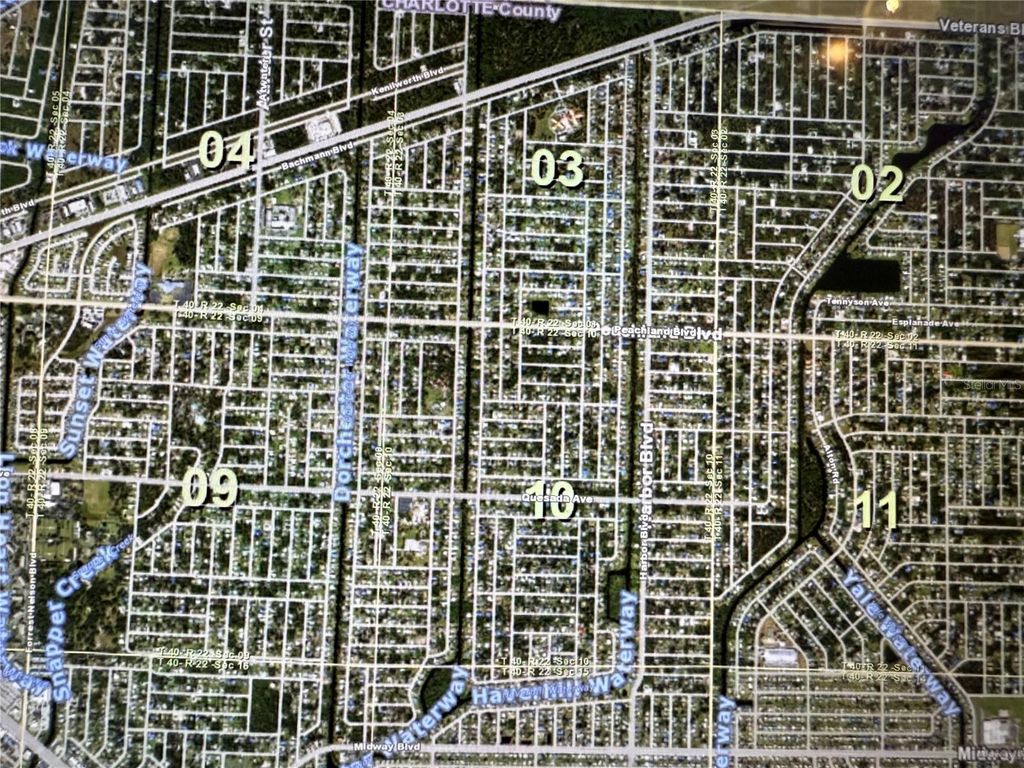 Photo of 1402 Yorkshire Street, Port Charlotte, FL 33952 (MLS # C7518459)