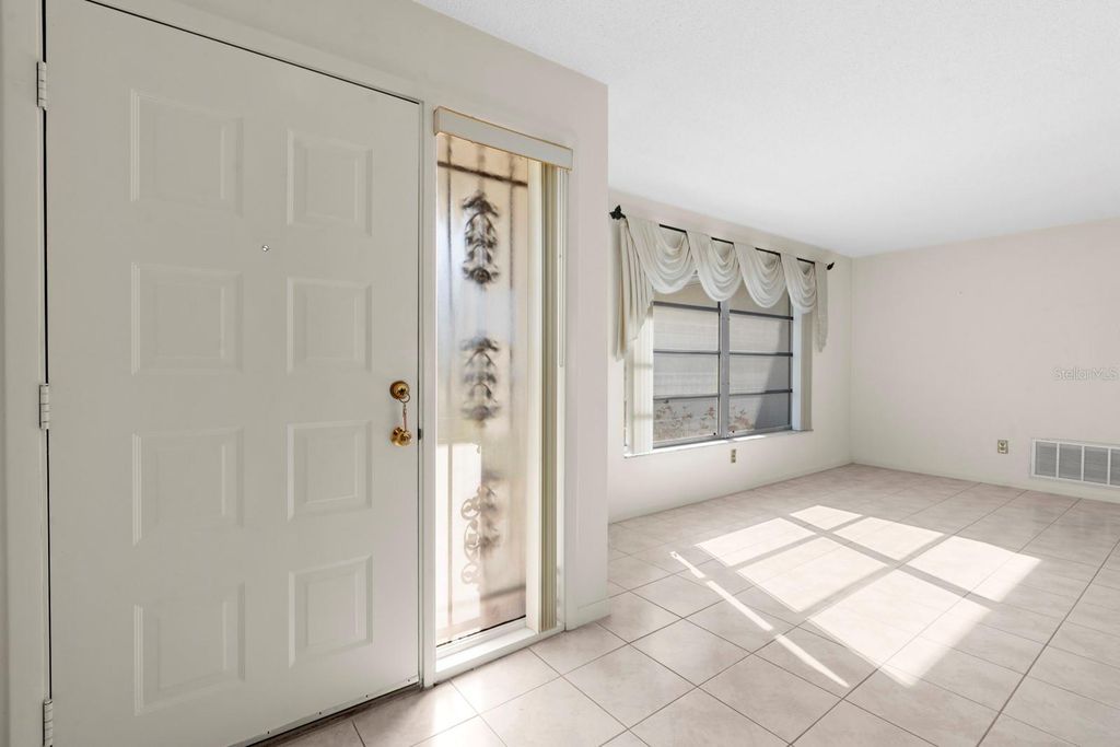 Photo of 2549 Wynnewood Drive, Clearwater, FL 33763 (MLS # TB8490284)