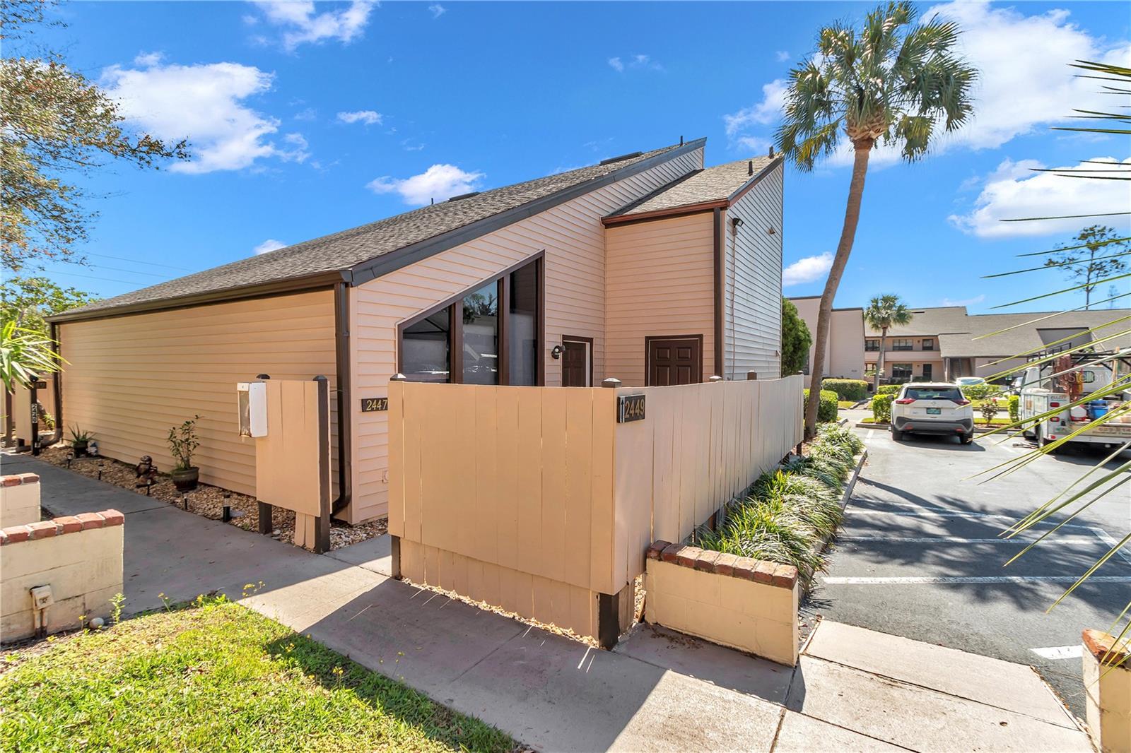One or more photo(s) has been virtually staged. Current appraisal fha 150k in this Modern and chic townhome in Bretton Woods with maintenance free living!! This renovated in 2023 end unit has an open concept with its own outdoor back patio with gated entrance & a lovely private courtyard patio entrance. Home features 1 bed upstairs in loft, 1 full bath upstairs and .5 bath on main level for your guests. 2023 luxury vinyl plank flooring. 2023 new kitchen with quartz countertops and island for barstools, and 2025 new range. New bathrooms, all new interior light fixtures & newly painted interior. High ceilings, modern finishes and outdoor living. You have your own reserved parking space & there is plenty of visitor parking as well. All of the amenities in this community include: pool, tennis courts, clubhouse and laundromat to name a few. HOA IS 343/Month...This is a don't miss equity opportunity!