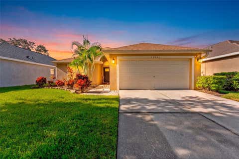 Photo of 18843 Maisons Drive, Lutz, FL 33558 (MLS # TB8538240)