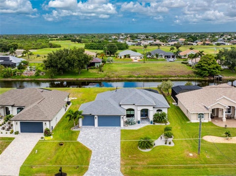 Photo of 940 Boundary Boulevard, Rotonda West, FL 33947 (MLS # D6147749)