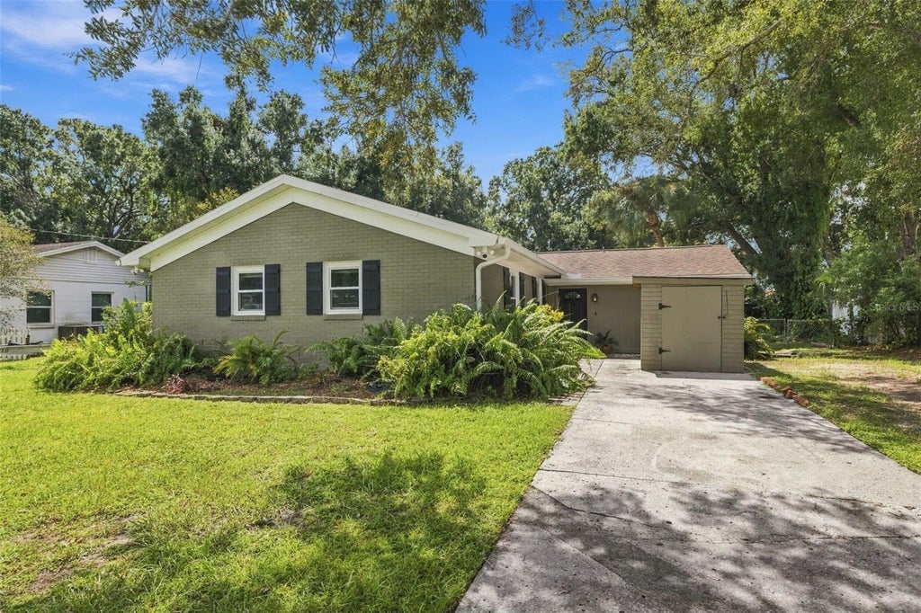 Photo of 6613 Travis Boulevard, Tampa, FL 33610 (MLS # TB8549568)